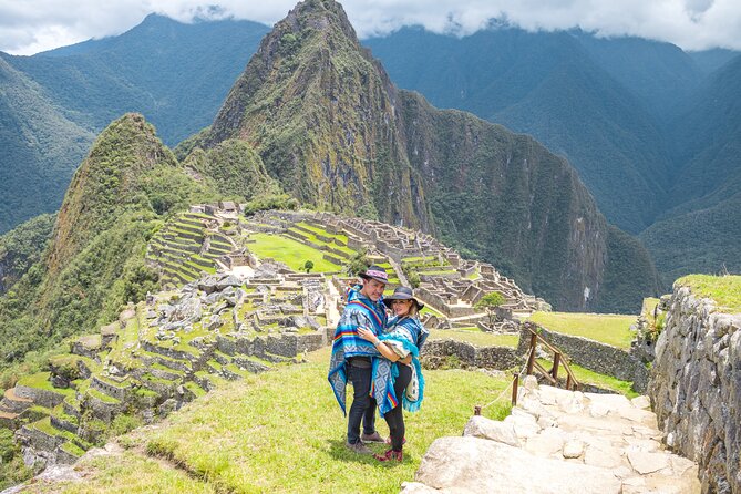2-Day Tour: Sacred Valley & Machu Picchu – All Tickets Included - Pisac terraces and the market town