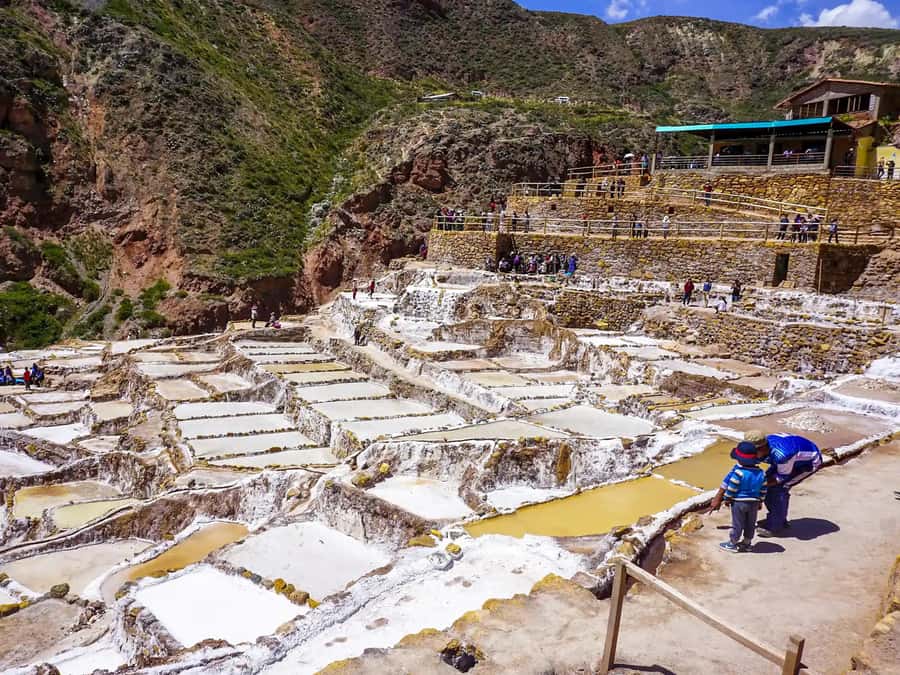 Cusco: Moray, Maras Salt Mines, and Chinchero Weavers Tour - Maras Village: colonial details before the salt ponds