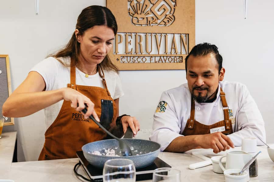 Cusco: Peruvian Cooking Class, Cocktails & Local Market Tour - Eating together, then finishing with picarones