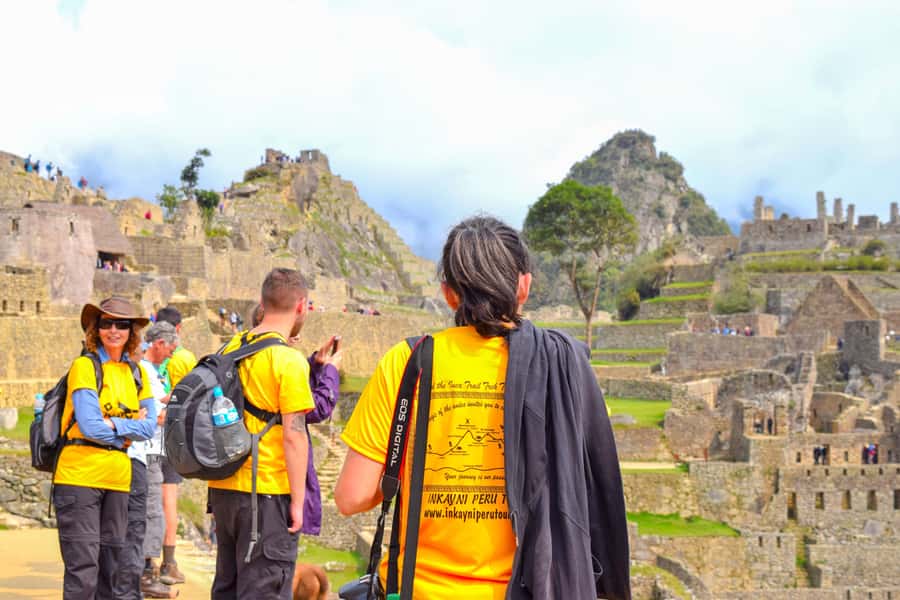 From Cusco: 4-Day Inca Jungle Adventure to Machu Picchu - Day 4: First buses and the stone terraces of Machu Picchu
