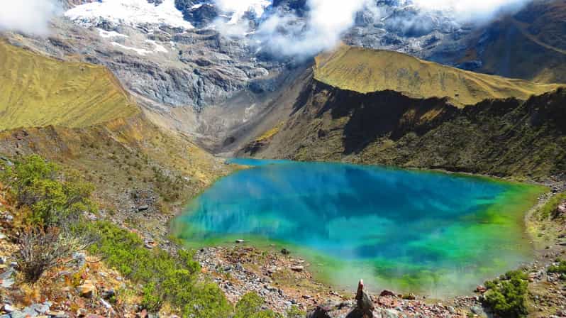 From Cusco: Hike to Humantay Lake one day With Meals - The uphill walk to Humantay Lake