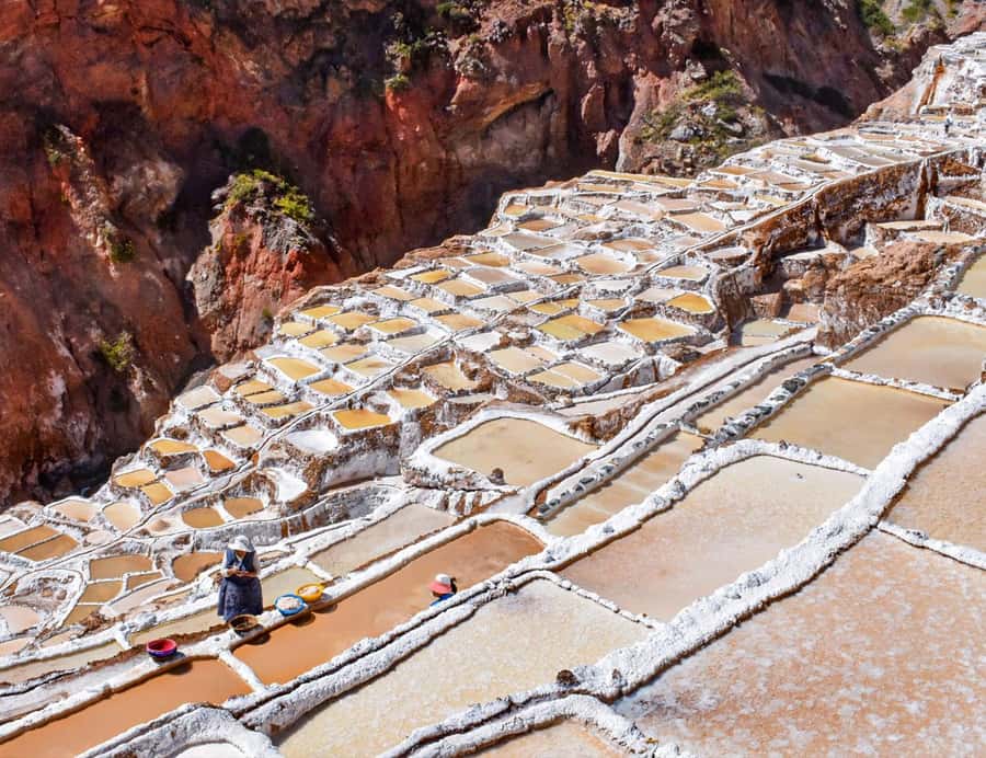 From Cusco: Moray, Maras Salt Mines & Chinchero Weavers Tour - Maras Village adds colonial-era stonework