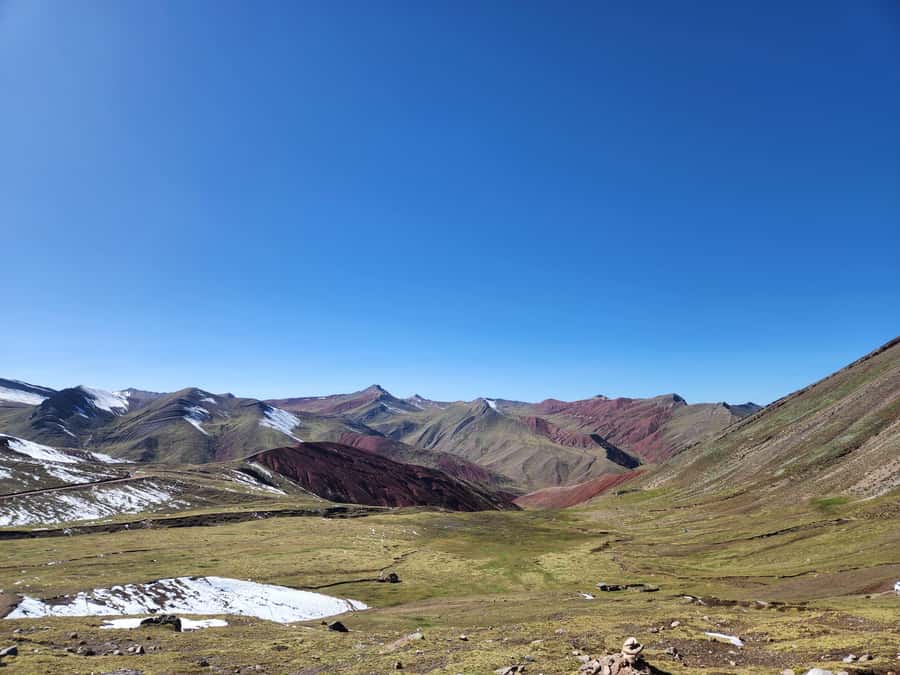 From Cusco: Palcoyo Rainbow Mountain Guided Tour - Walking among Palcoyo’s three colored peaks