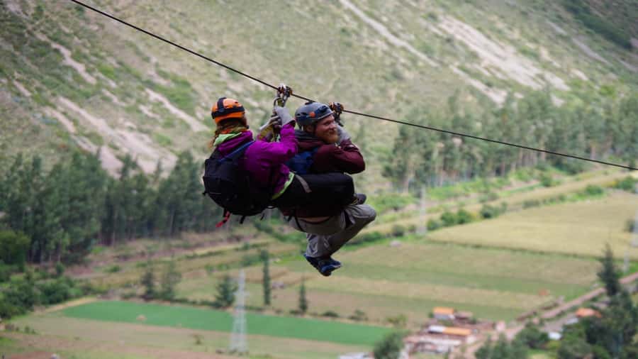 From Cusco: Via Ferrata & Zip Line with lunch - Zip lining down the Sacred Valley