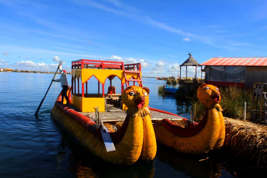 From Puno: Uros floating islands half Day tour - Meeting a family on the islands