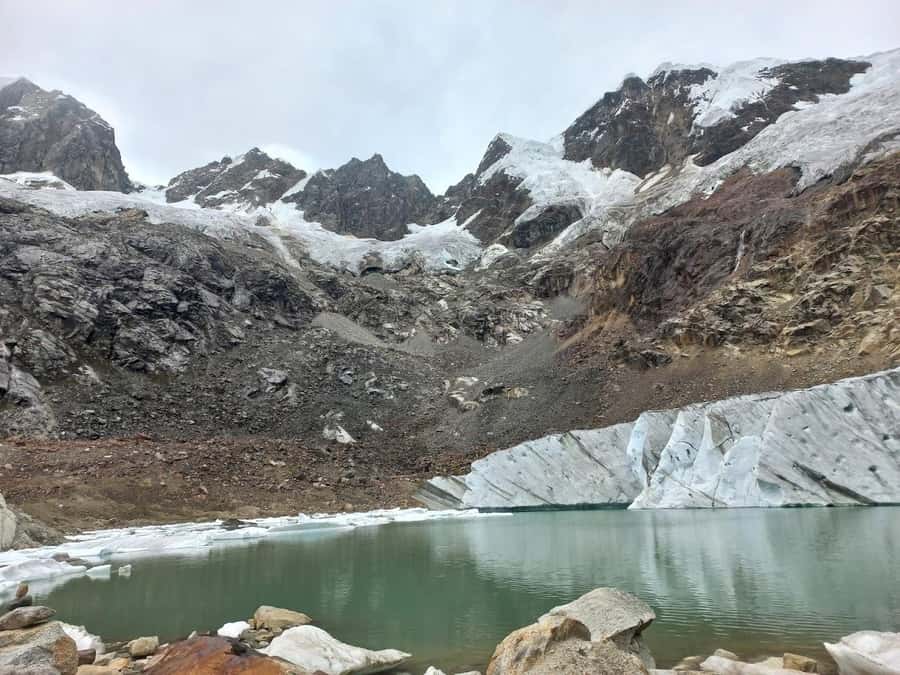 Huaraz: Full Day Rocotuyoc Lagoon + Frozen Lagoon - Llamaruri cave paintings and Paqcharuri waterfall round out the day
