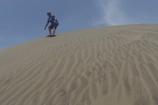In Lima: Sandboarding Off Road Half Day!! - Abraham’s beginner lesson on a small dune