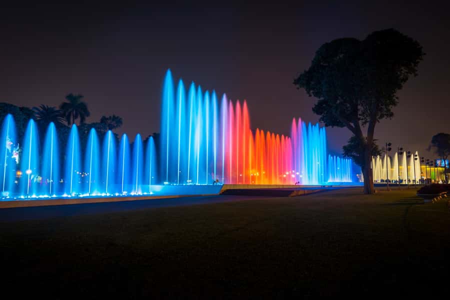 Lima: Magic Water Circuit Light Show Tour with Pickup - Walking through the park’s 13 fountains