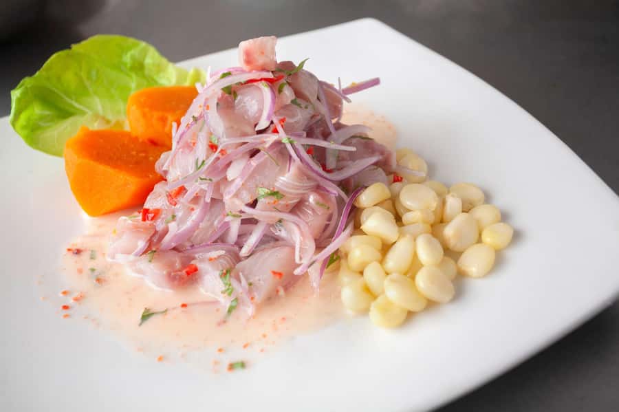 Lima: Market Tour and Cooking Class with Pisco Sour - From market ingredients to Peruvian dishes