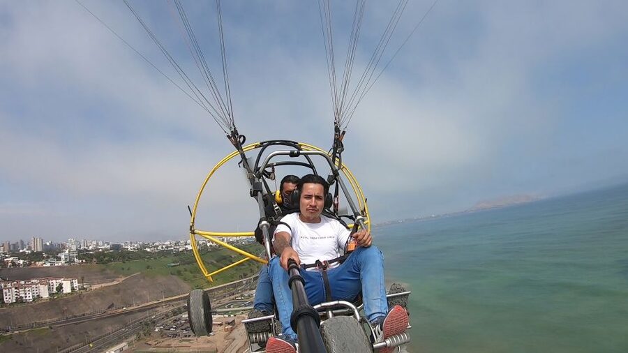 Lima: Paragliding Flight Over Costa Verde Districts - The video is useful, but delivery may lag