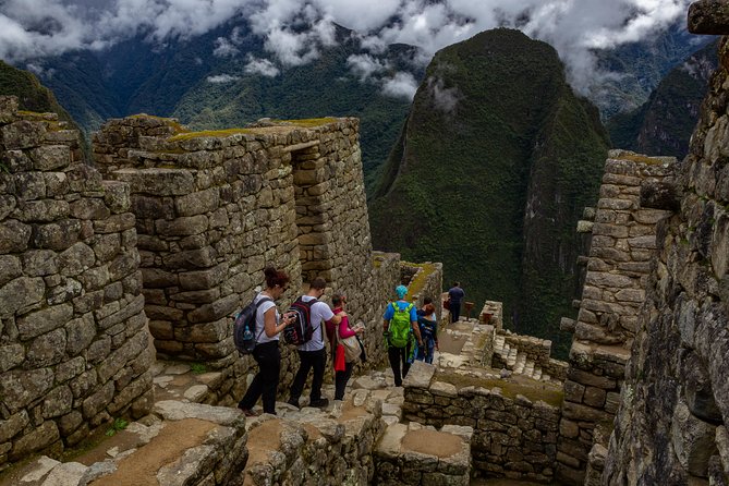 Machu Picchu Tour by Vistadome Panoramic Train from Cusco - Aguas Calientes and the 25-minute climb