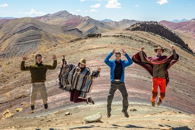 Private Palccoyo Rainbow Hike Without the Crowds - Walking with alpacas toward three mountain views