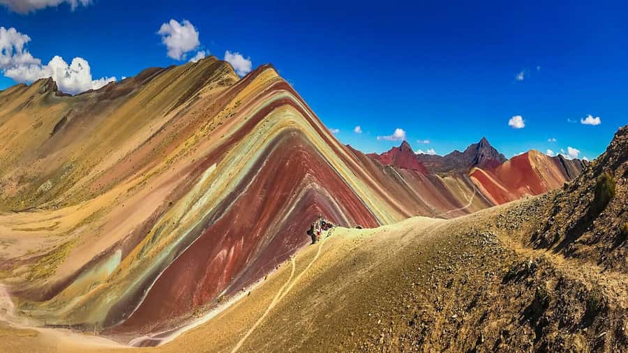 Rainbow Mountain tour and Machu Picchu tour by train - Lunch, hot springs, and the return journey