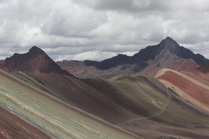 Rainbow Mountain Tour Vinicunca (Full Day) - The 7-kilometer path to the striped summit